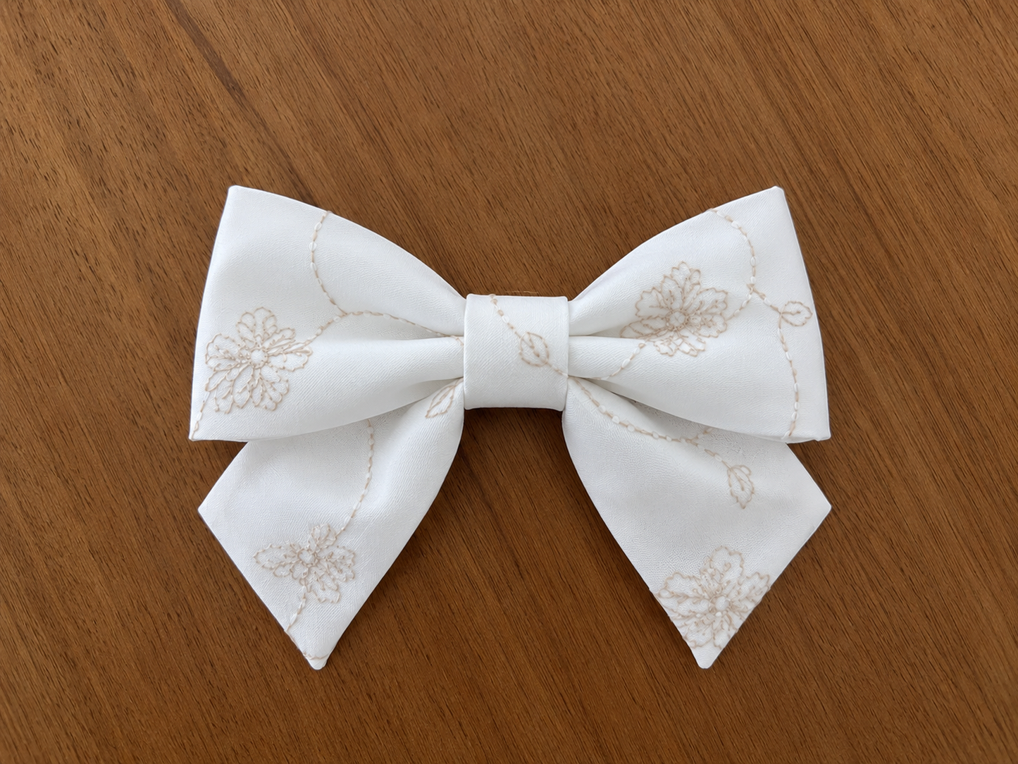 Ivory gold bow