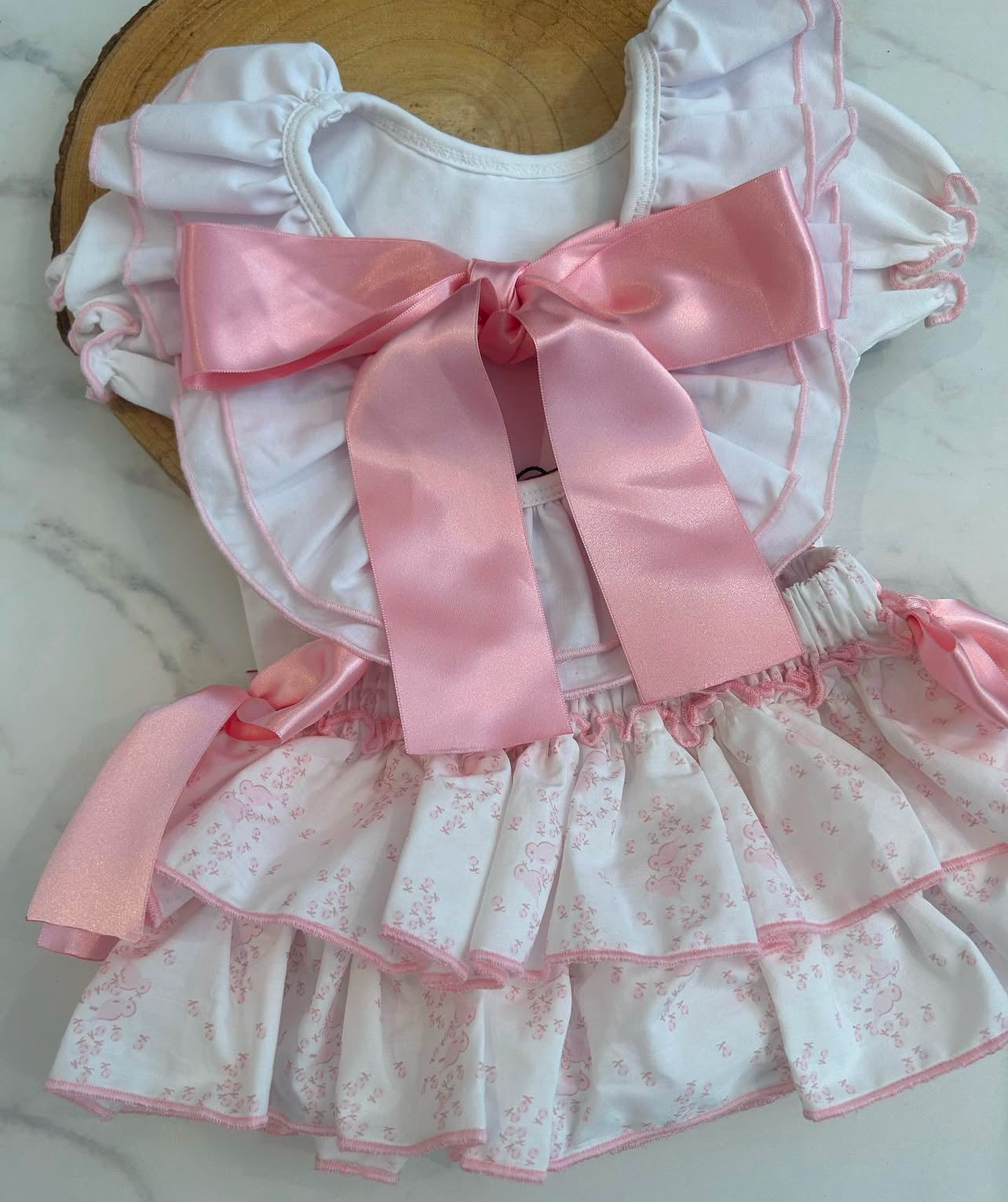 Pink bow top