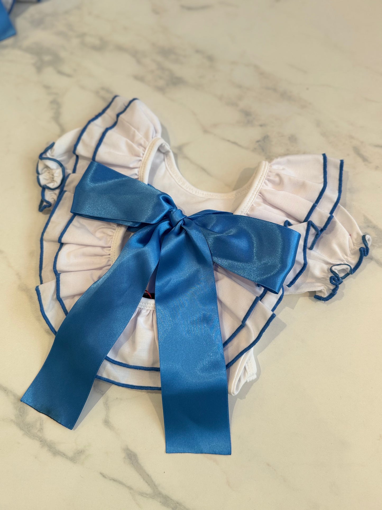 Bow lint blue top