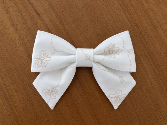 Ivory gold bow